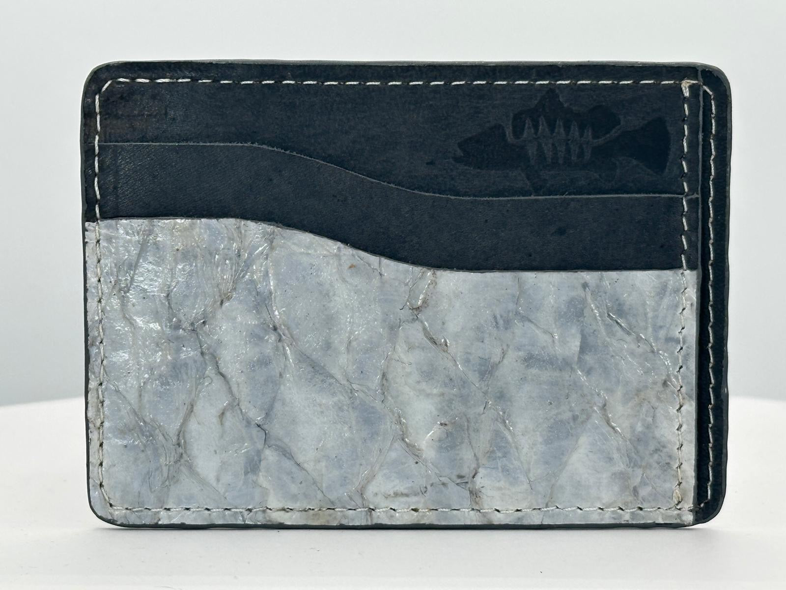 Barramundi leather card holder with grey leather card slots at top and white background - front