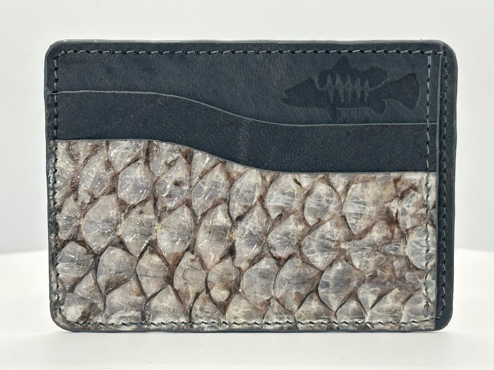 Barramundi leather card holder with grey leather card slots at top and white background - front