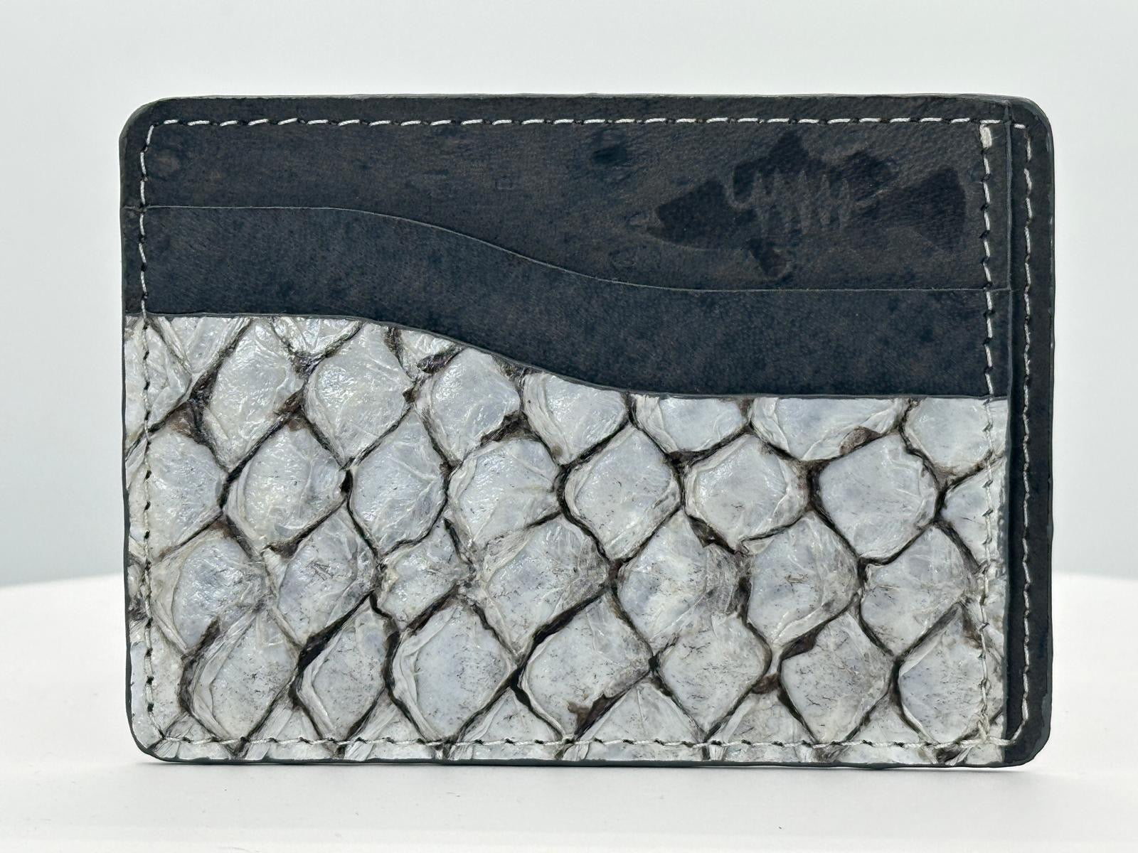 Barramundi leather card holder with grey leather card slots at top and white background - front