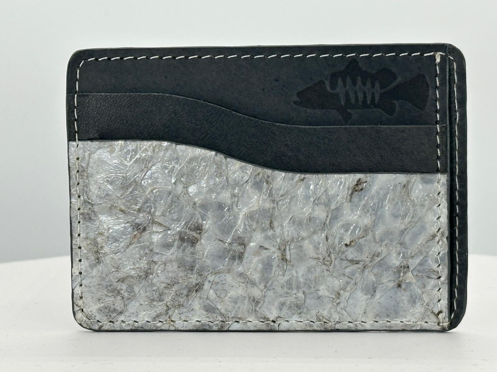 Barramundi leather card holder with grey leather card slots at top and white background - front