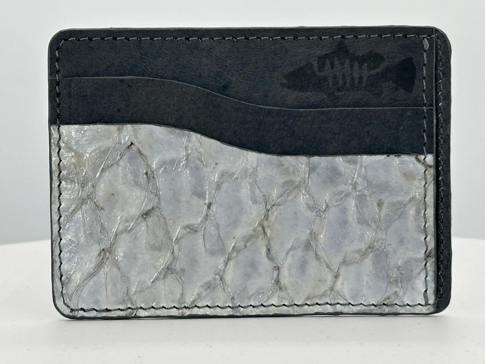 Barramundi leather card holder with grey leather card slots at top and white background - front