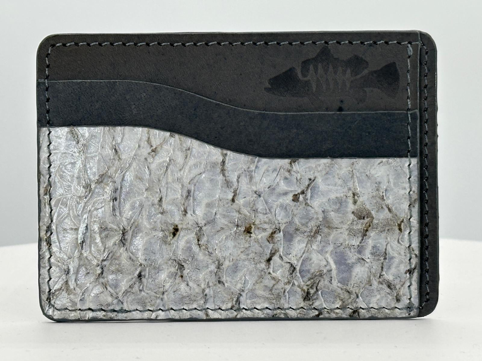 Barramundi leather card holder with grey leather card slots at top and white background - front