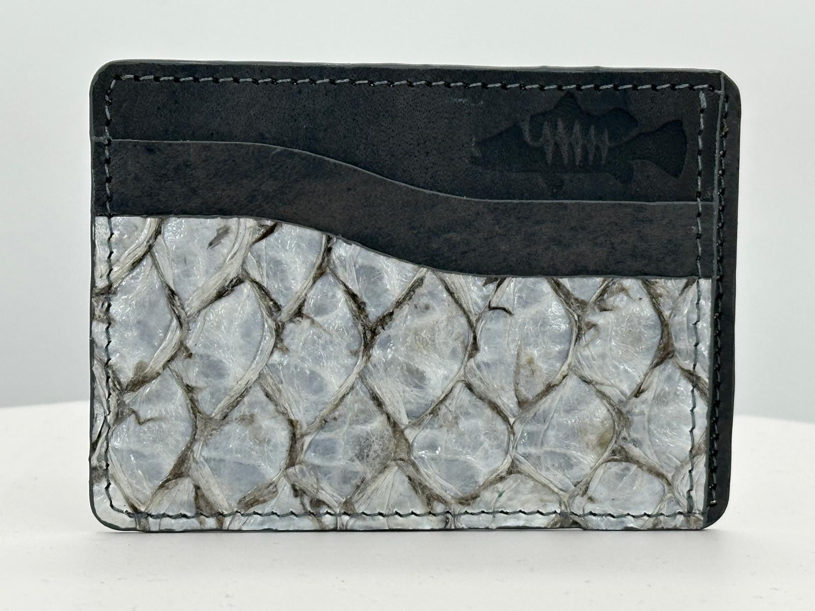 Barramundi leather card holder with grey leather card slots at top and white background - front
