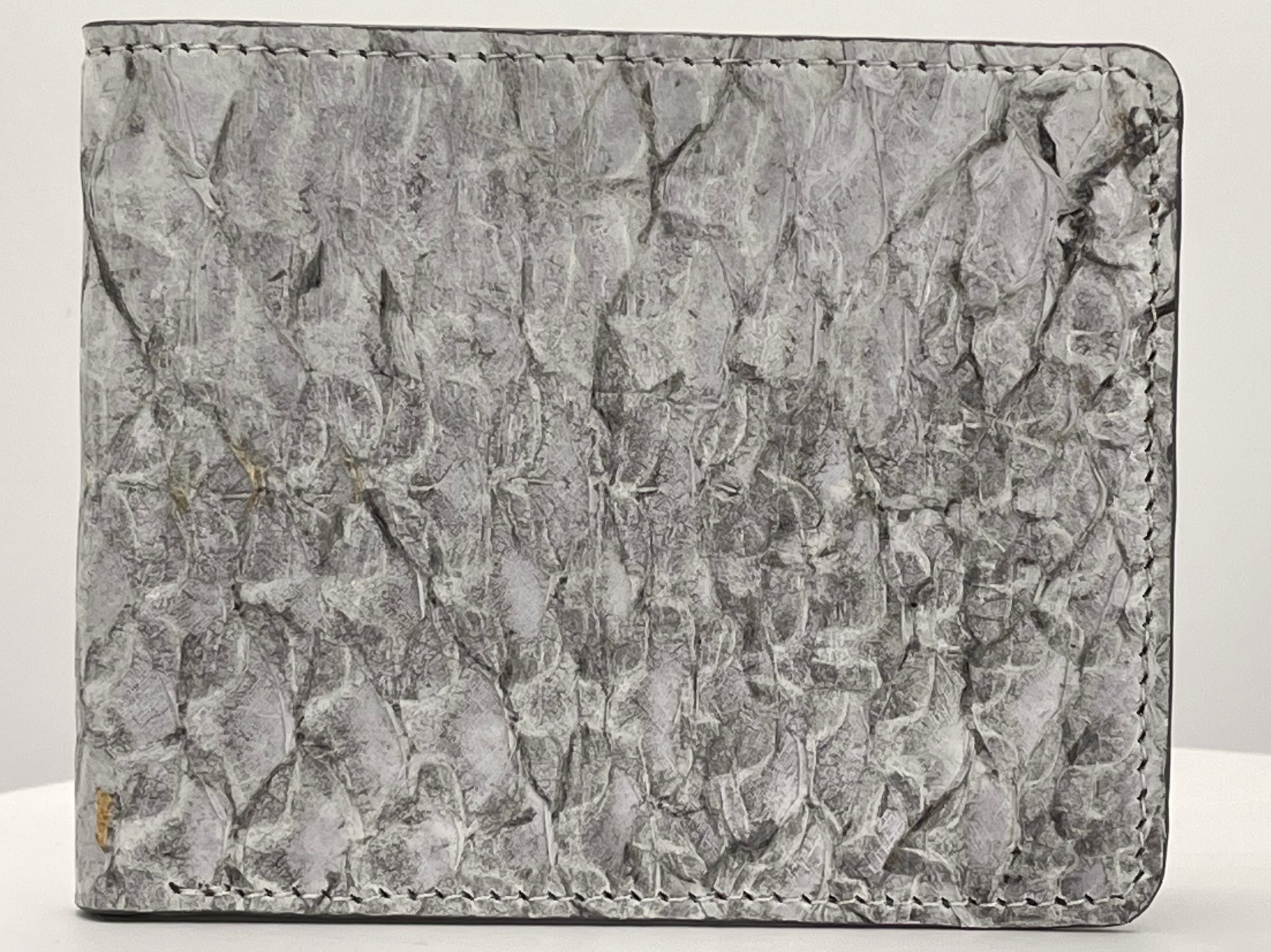 Barramundi skin wallet on a white background - front