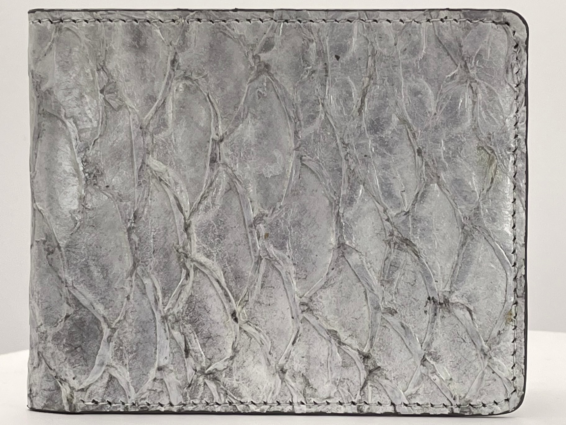 Barramundi skin wallet on a white background - front