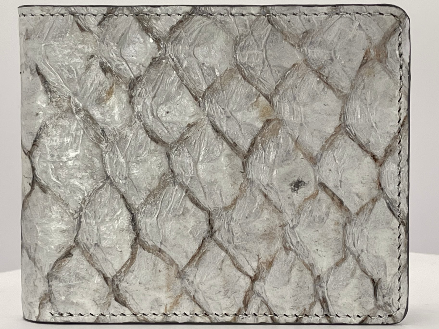 Barramundi skin wallet on a white background - front