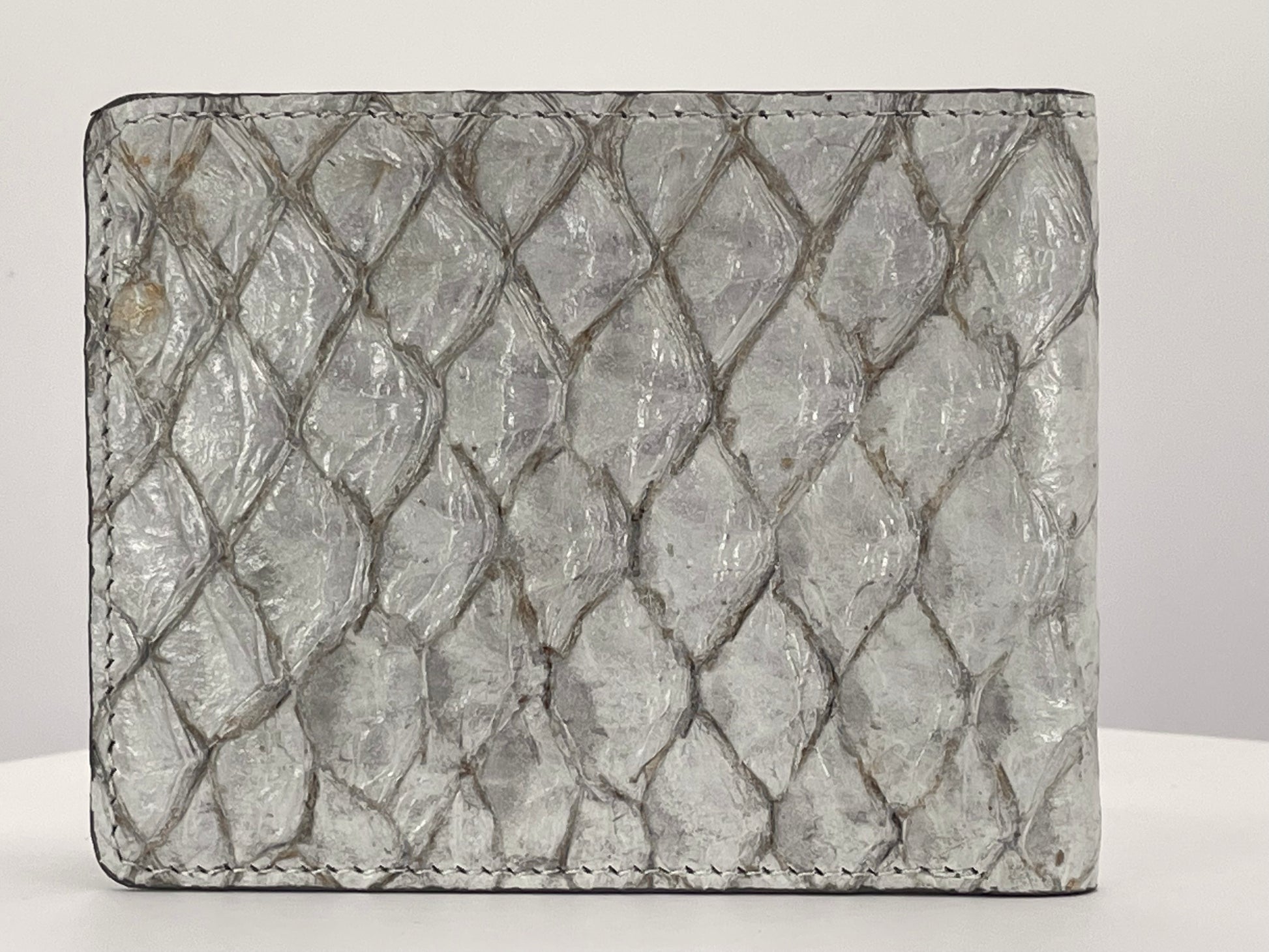 Barramundi skin wallet on a white background - back