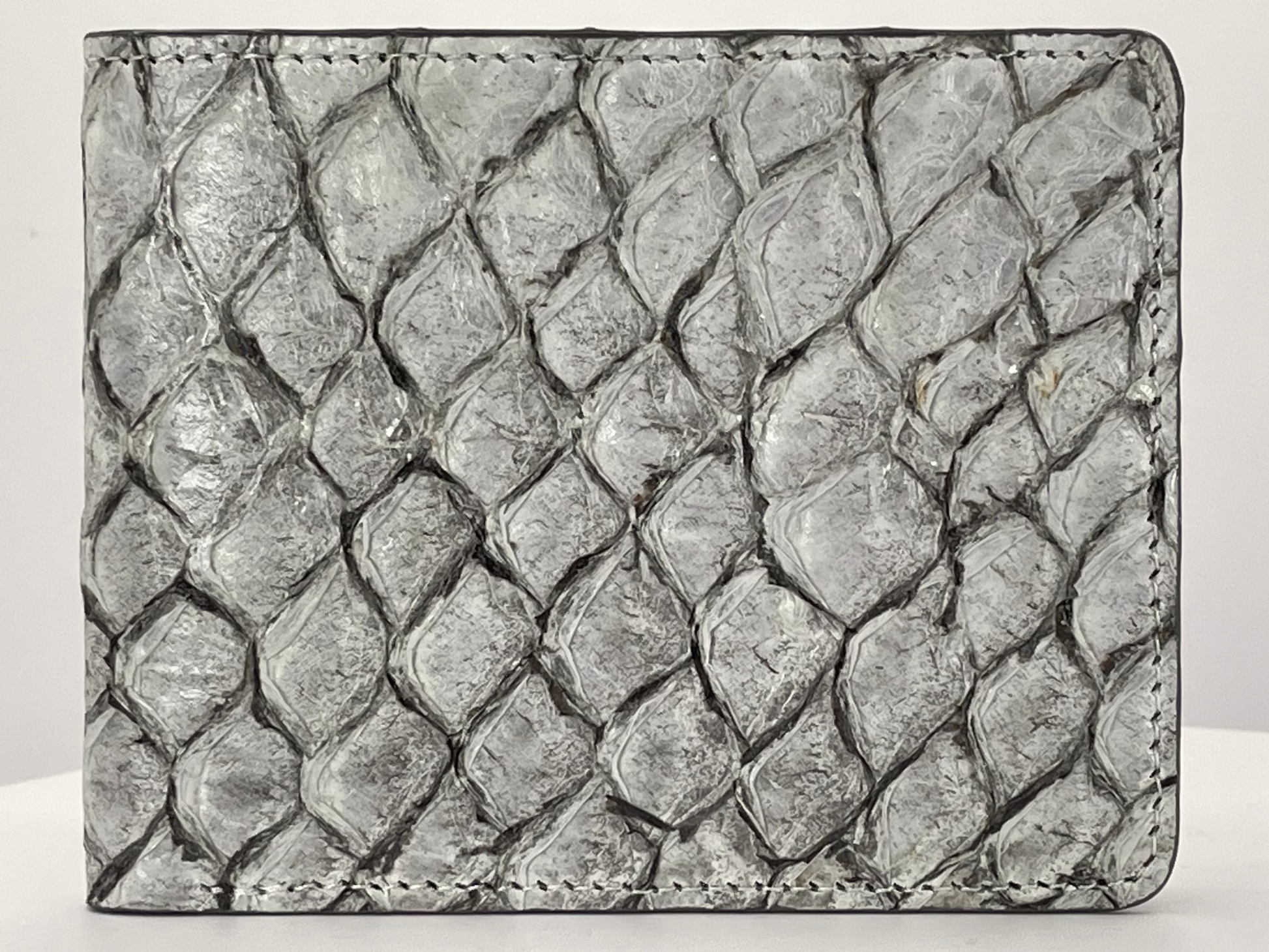 Barramundi skin wallet on a white background - front