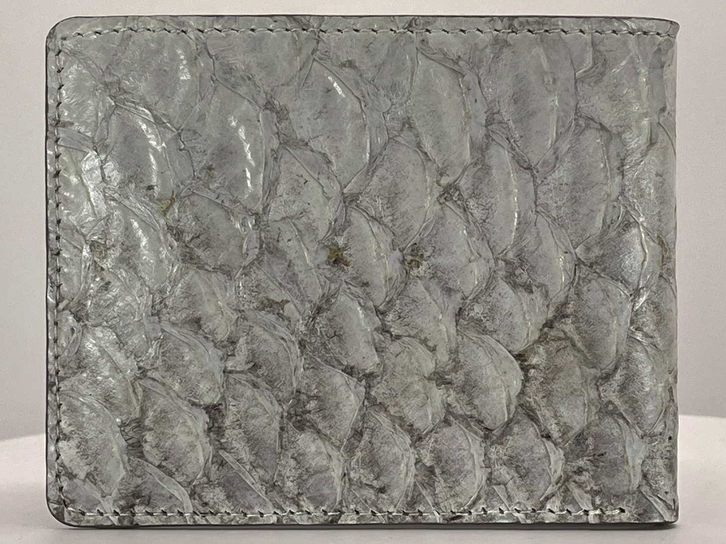 Barramundi skin wallet on a white background - front