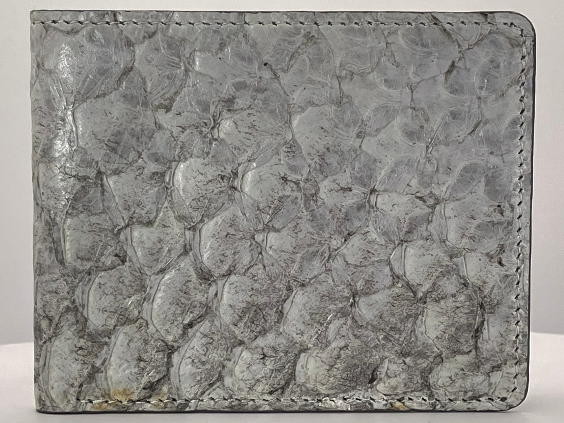 Barramundi skin wallet on a white background - front