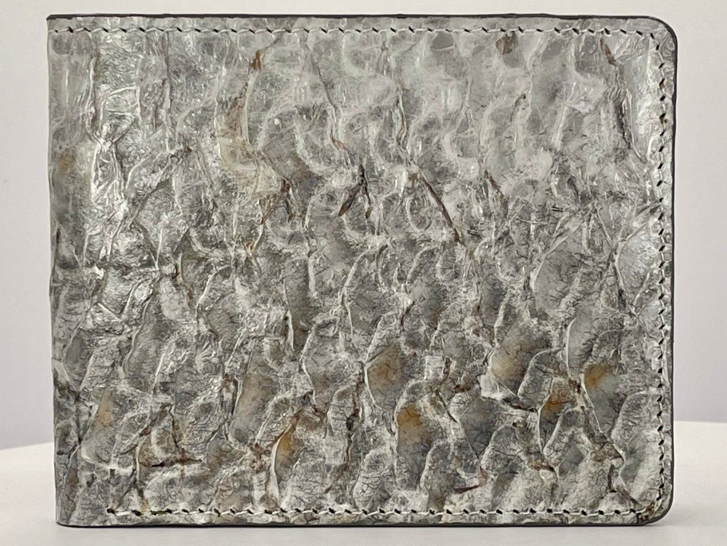 Barramundi skin wallet on a white background - front