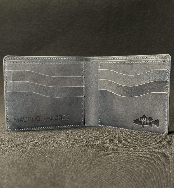 Bi-Fold wallet inside made from denim coloured leather showing personal engraving option with a barramundi log stamp on otherside