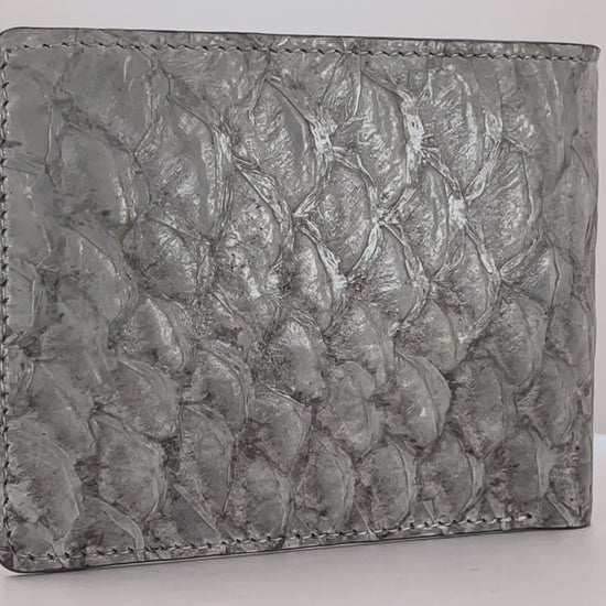 Barramundi skin wallet on a white background, denim leather interior - Video