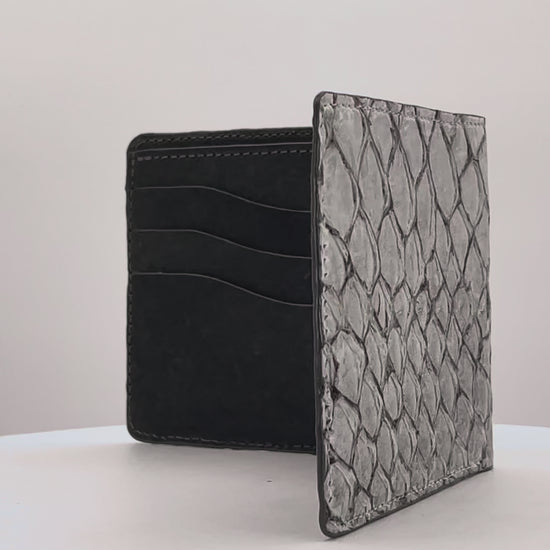 Barramundi skin wallet on a white background, denim leather interior